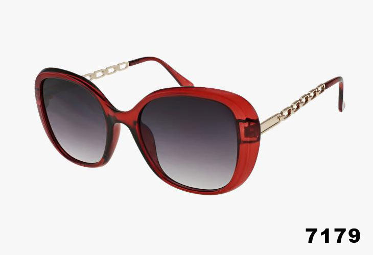 Red sunglasses with a gradient lens on a white background