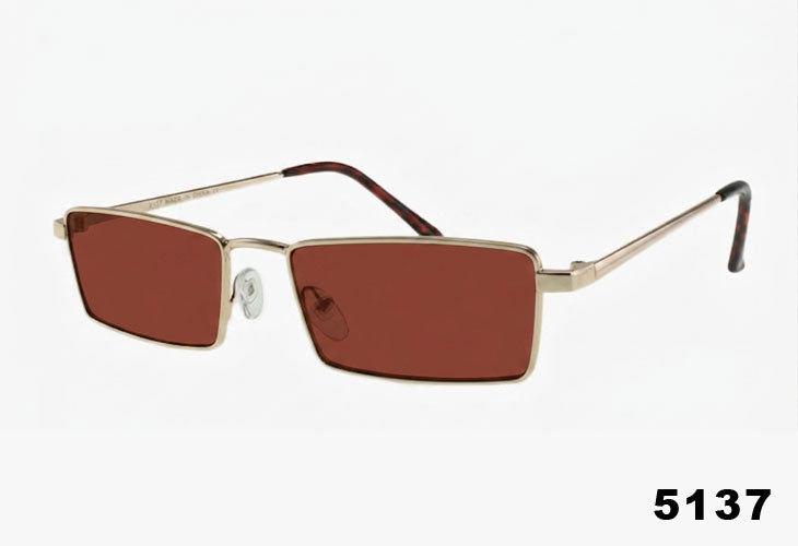 Sunglasses with gold frame and brown lenses on a white background