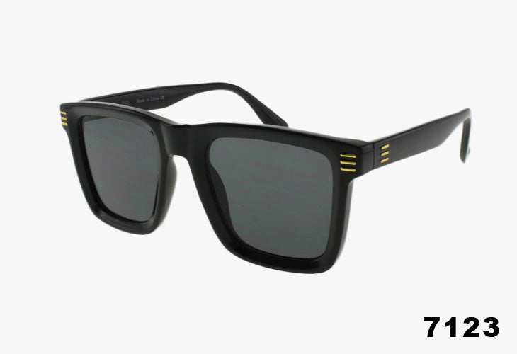 Black sunglasses with gold accents on a white background