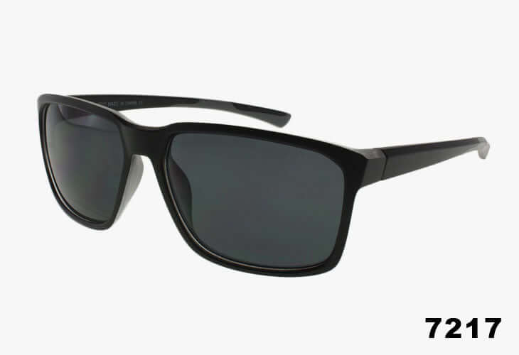 Black sunglasses with dark lenses on a white background