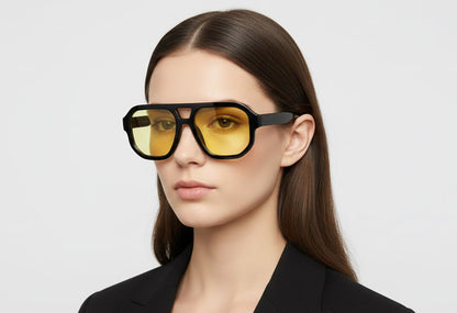 woman wearing black sunglasses with yellow tinted lenses