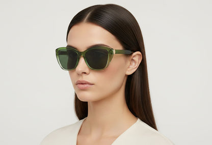 woman wearing green cat eye style sunglasses