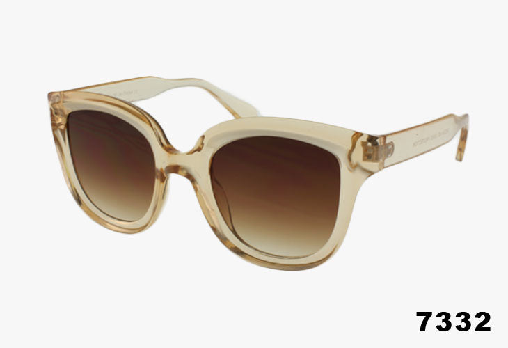 Beige sunglasses with gradient lenses on a white background
