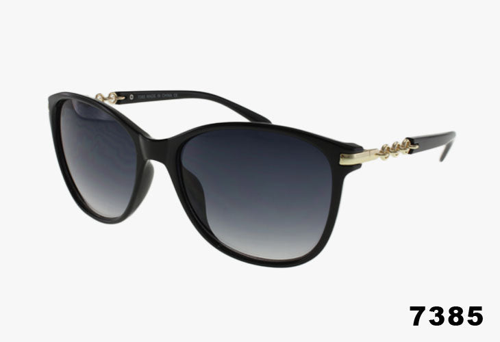 Black sunglasses with gold accents on a white background