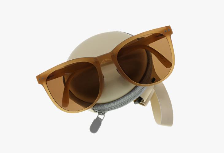 beige Wholesale Oval Folding Sunglasses and round zipper enclosed case