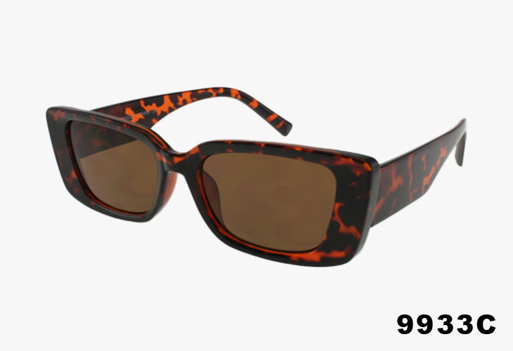 Sunglasses with red and black tortoiseshell frame on a white background