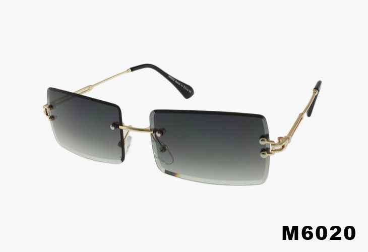 Sunglasses with gold frame and gradient lenses on a white background