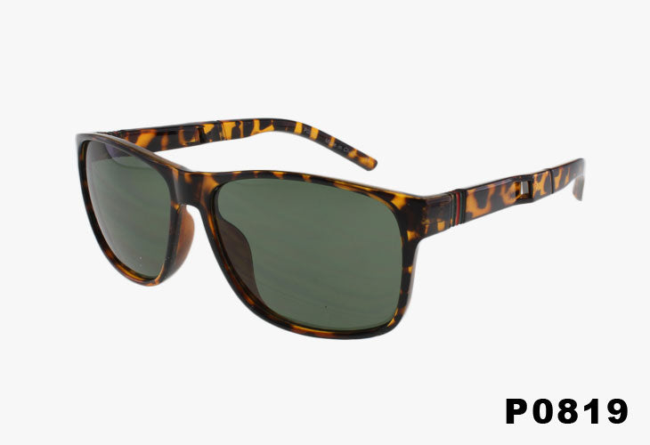 Sunglasses with tortoiseshell frame and green lenses on a white background