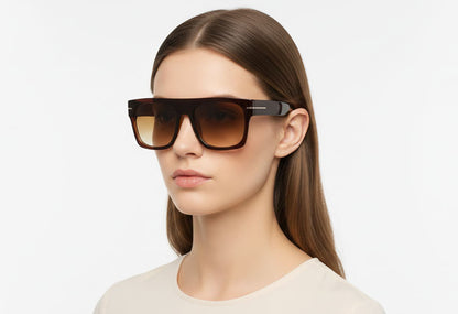 Woman wearing a pair of sunglasses with a plain background